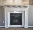 Artificial Fireplace New Cozy Up to This Fireplace Surrounded with White Subway Tile