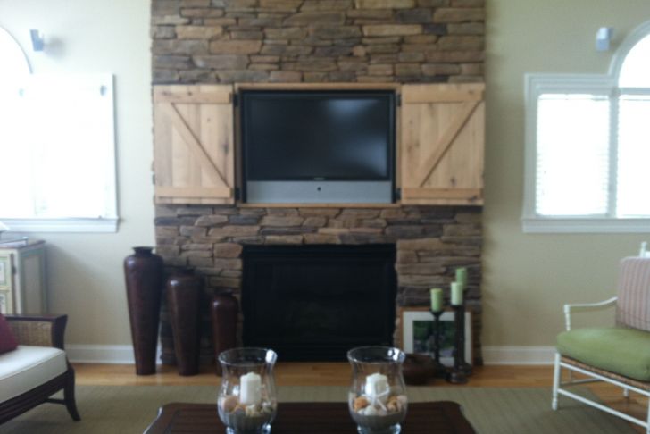 Decorating Ideas for Tv Over Fireplace Lovely Hidden Tv Over Fireplace Open Doors Decor and Design