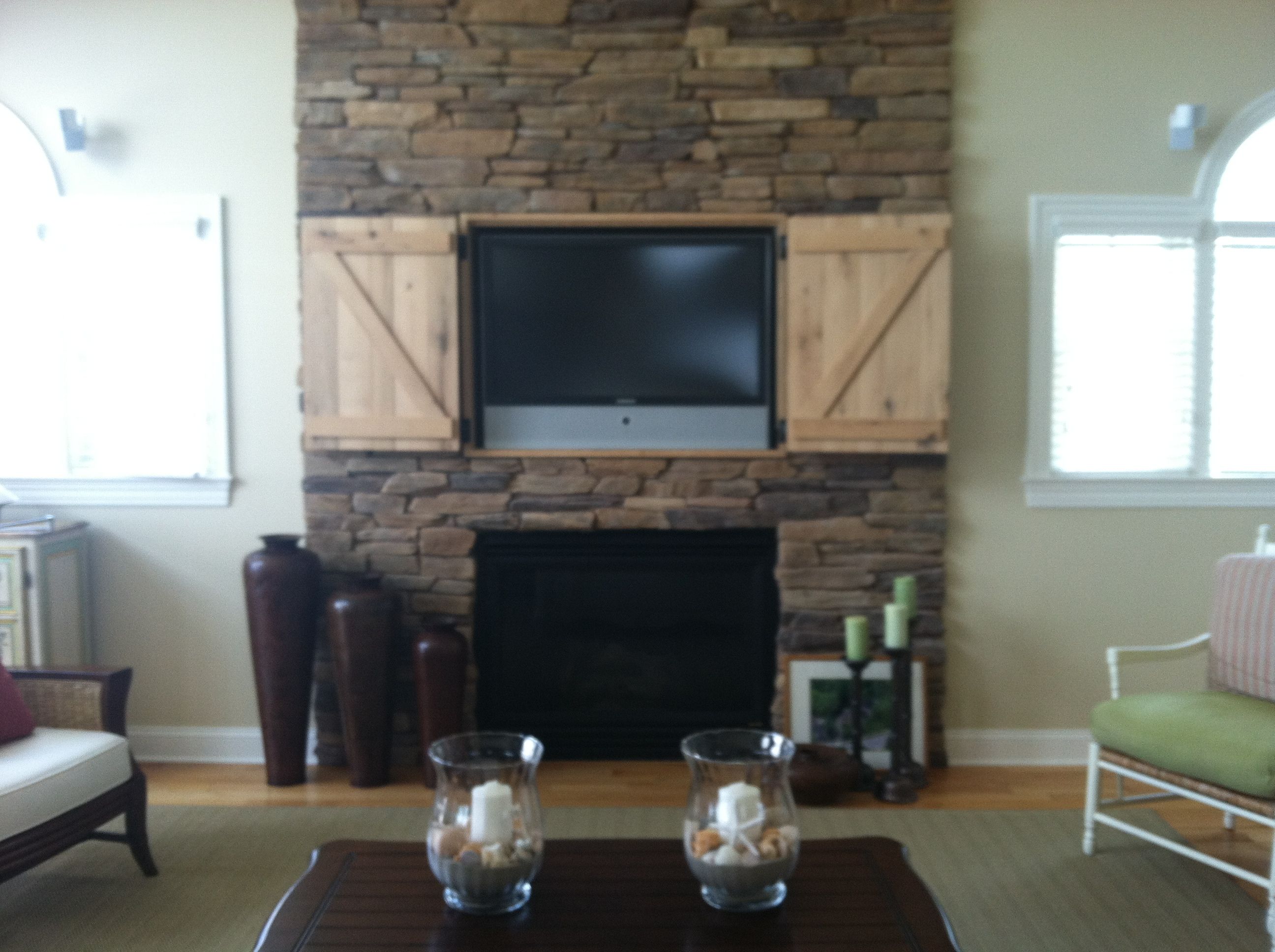 Fireplace Under Tv Awesome Hidden Tv Over Fireplace Open Doors Decor and Design