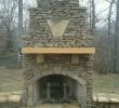 Fireplaces Birmingham Unique Fireplace with Cypress Wood Mantle and Custom Stone Plaque