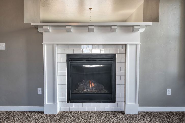 Preway Fireplace Company Awesome Cozy Up to This Fireplace Surrounded with White Subway Tile